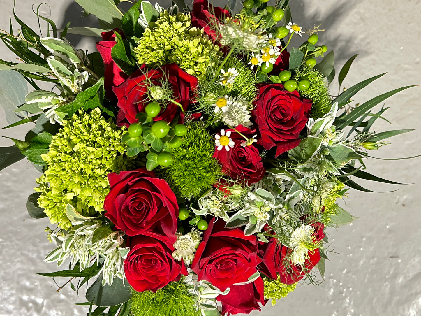 Extravagant 12 Red Rose Vase Arrangement