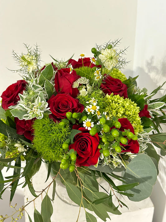Extravagant 12 Red Rose Vase Arrangement
