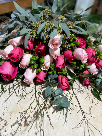 The Deluxe (24 long-stem Red or Pink Rose Bouquet)