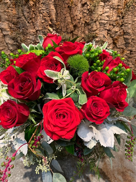 Extravagant 12 Red Rose Vase Arrangement